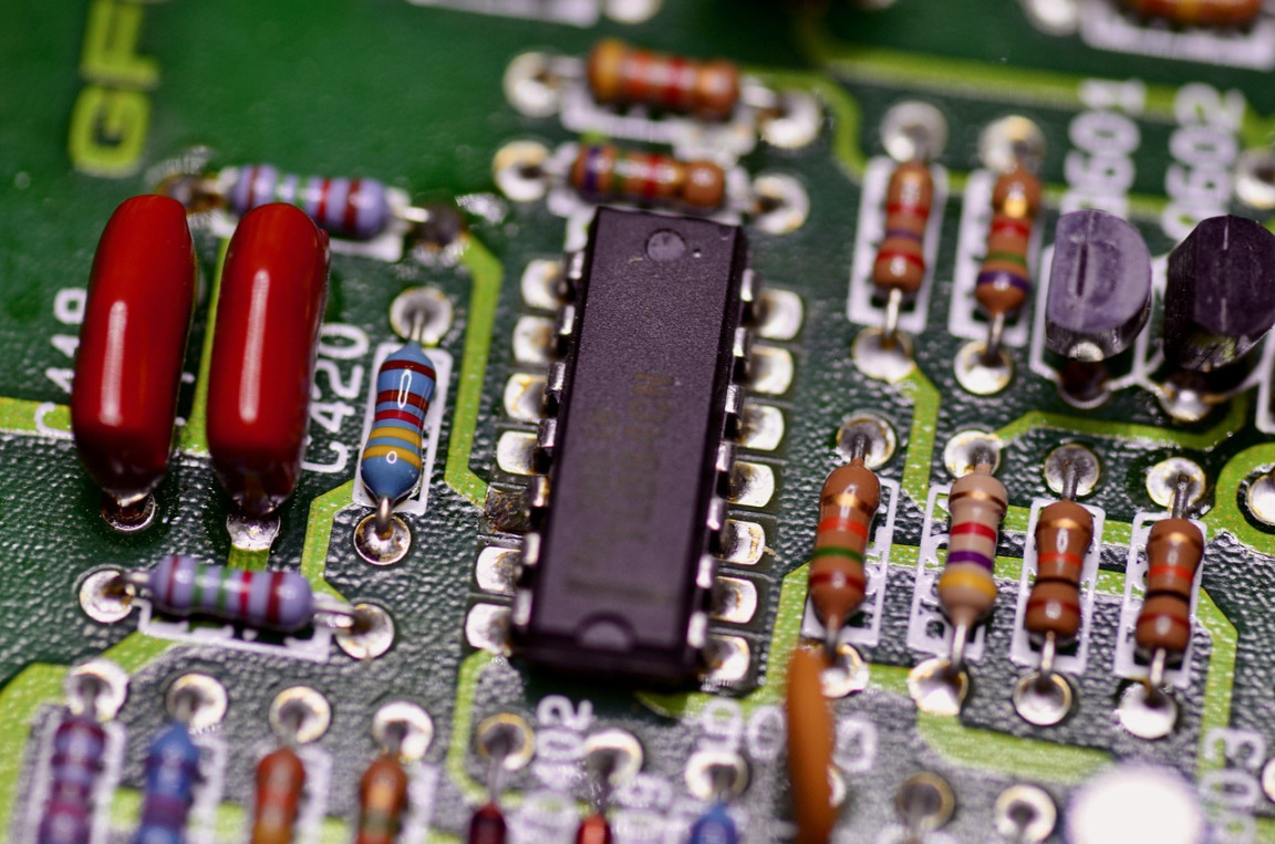 electronics pcb soldering iron closeup